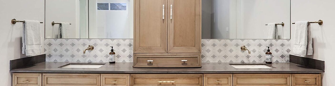 Bathroom with a tiled shower enclosure and a furniture-style vanity